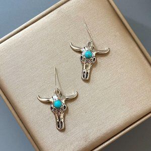 Women's cow earrings